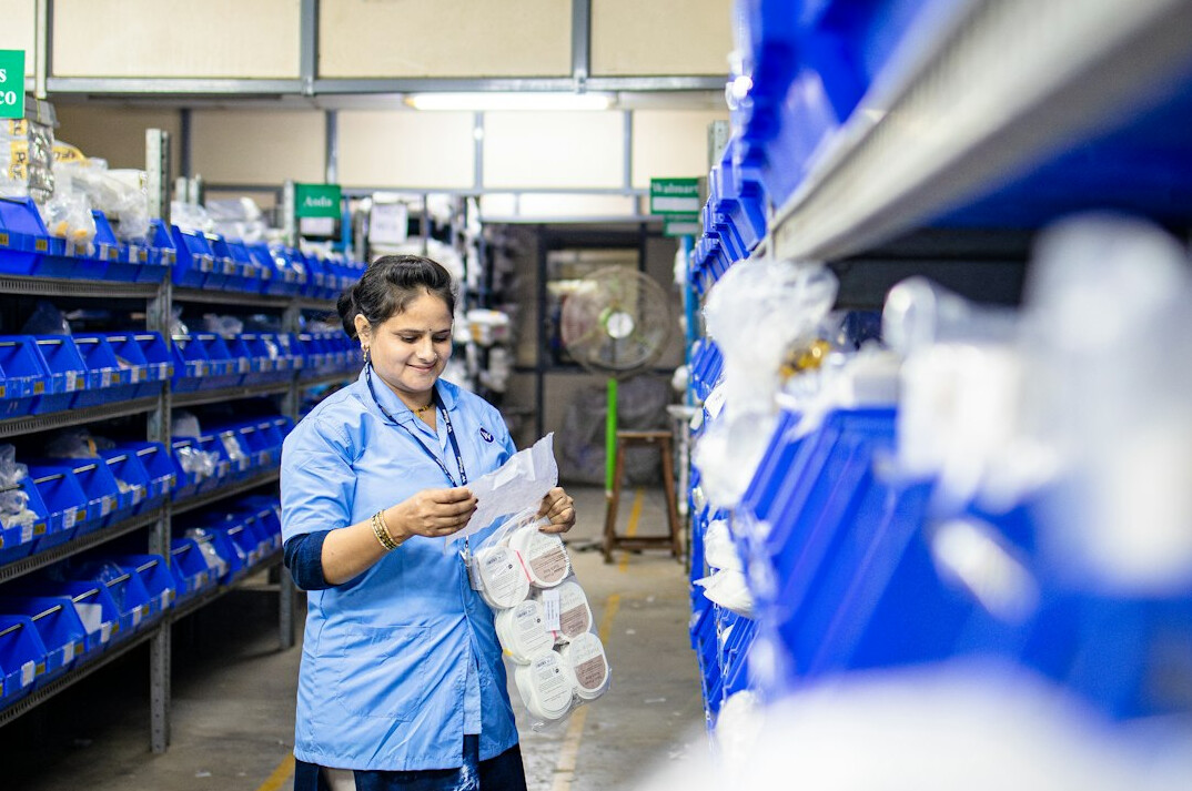 retail employee checking stock