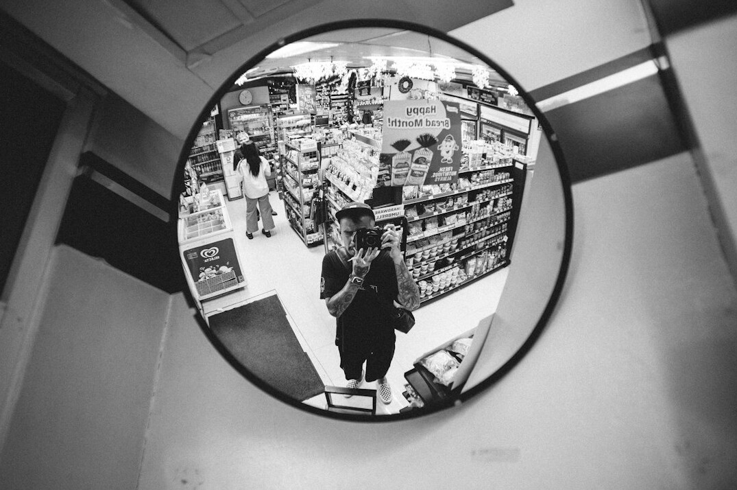 store detective watching security camera
